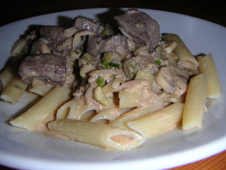 Boeuf Stroganoff over pasta